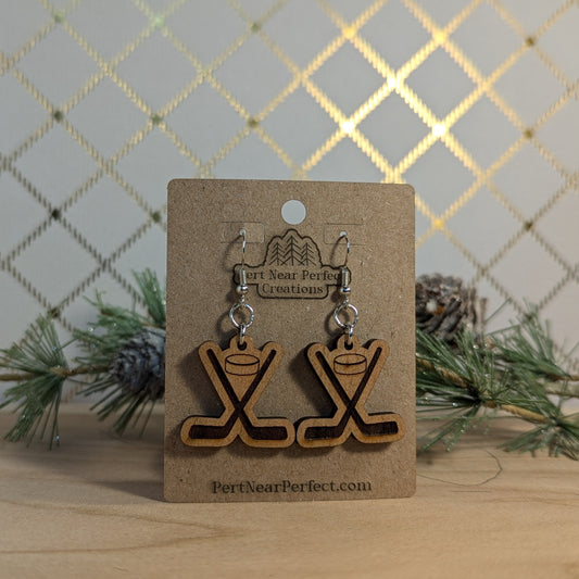 Hockey Themed Earrings Crossed Sticks with Puck - Dangles